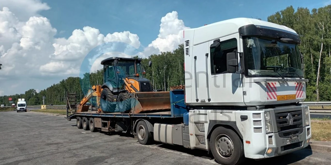 Доставка экскаватора-погрузчика в Краснодарский край