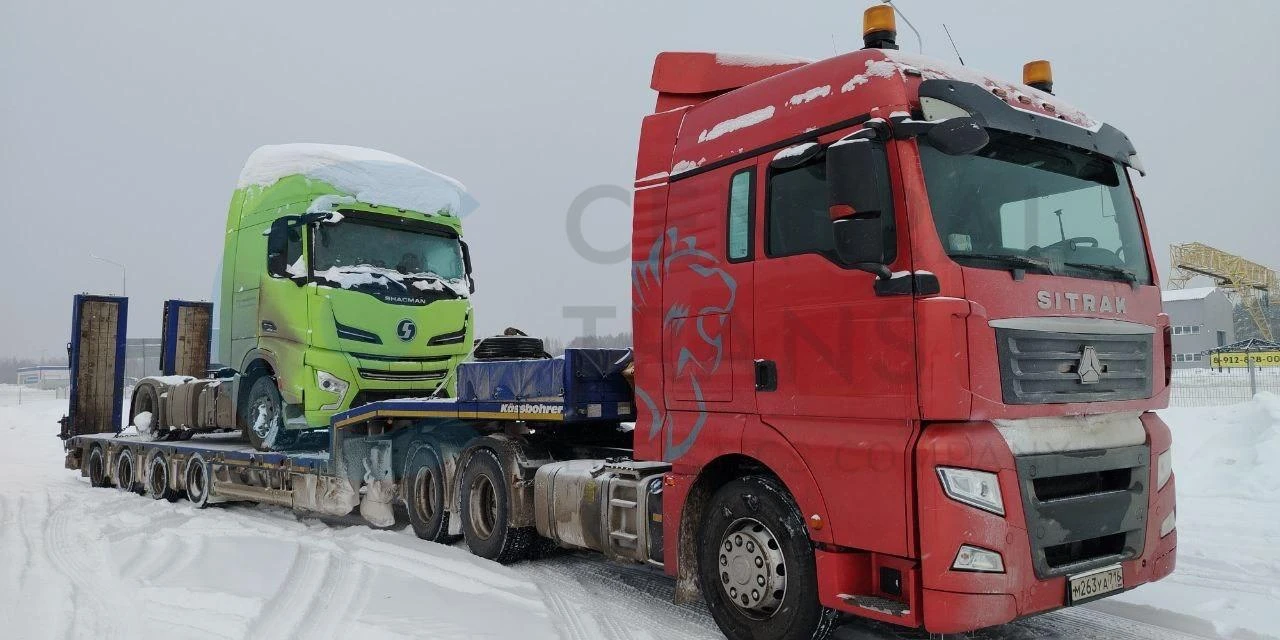 Перевозка тягача Shacman X6000 на трале по направлению Москва - Санкт-Петербург