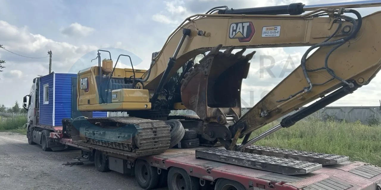 Перевозка экскаватора Caterpillar 320 и бытовки из Иркутска в Курган