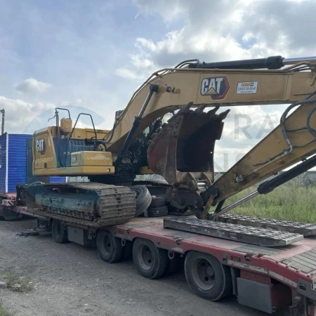 Перевозка экскаватора Caterpillar 320 и бытовки из Иркутска в Курган